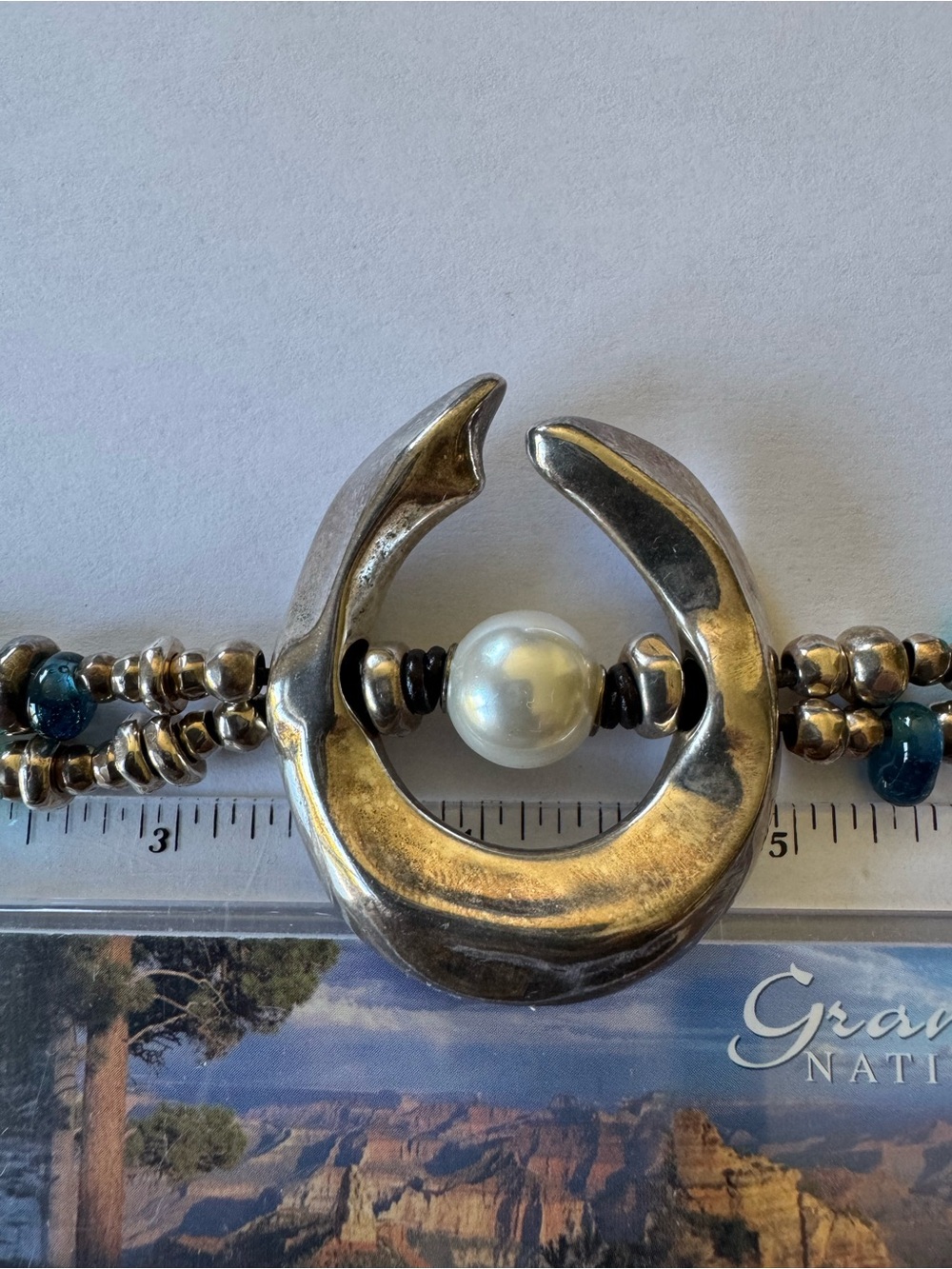 UNO de 50 Silver Crescent Bracelet with Turquoise and Pearl Accents - Picture 3 of 8